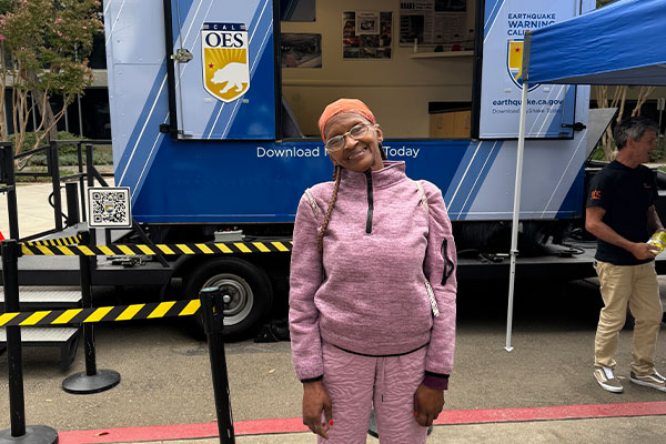 Image: Elsina poses in front of the earthquake simulator.